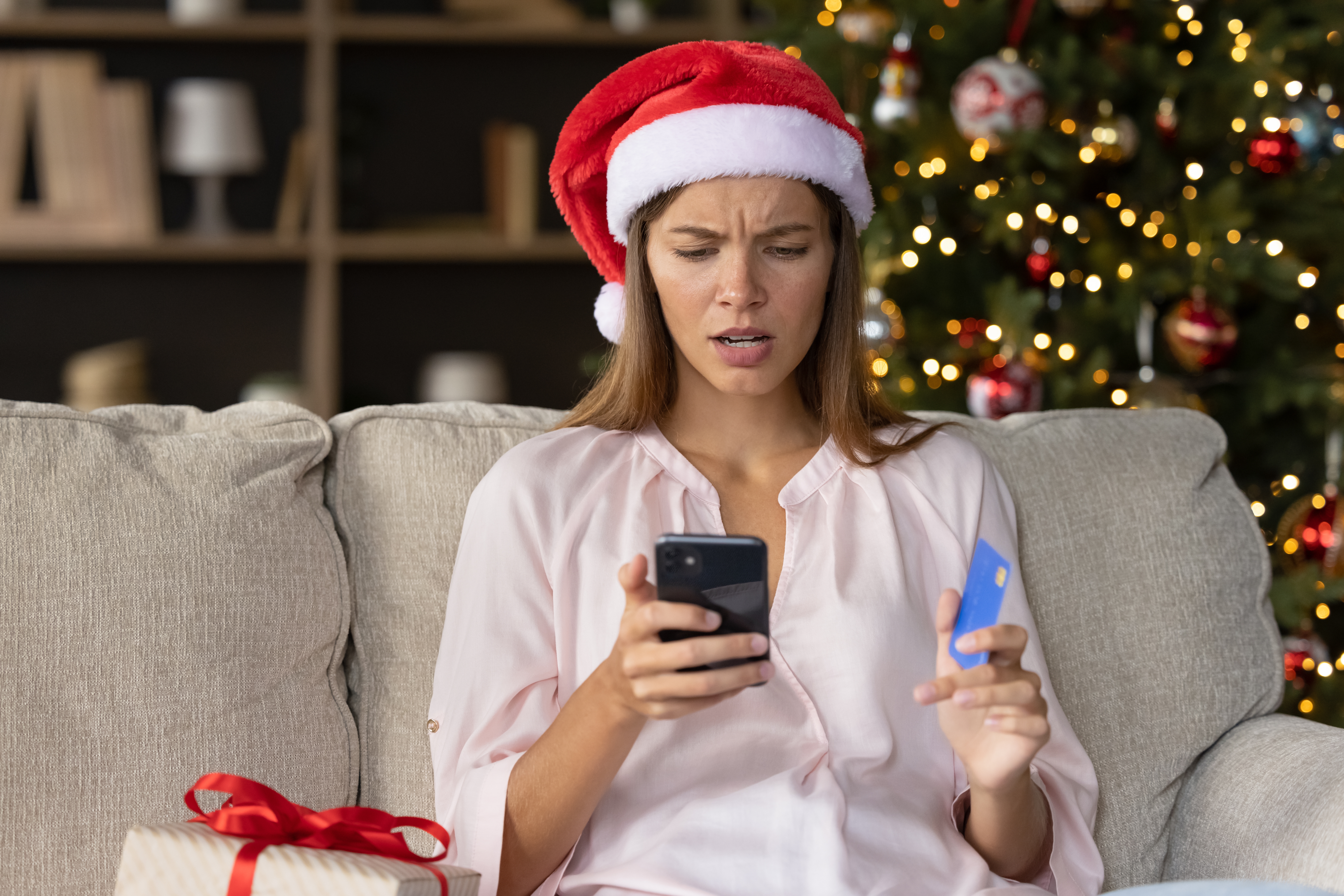 Worried,Concerned,Girl,In,Christmas,Santa,Hat,Having,Problems,With